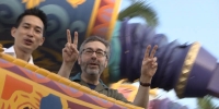 Epic Mickey designers Warren Spector and Peter Ong ride an inspiration for their upcoming games, Aladdin's Magic Carpet Ride at Disney World.